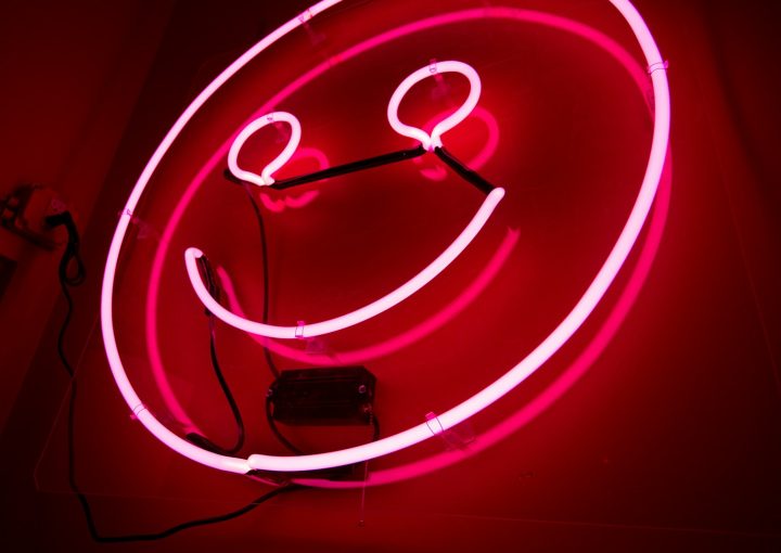 pink emoji neon signage