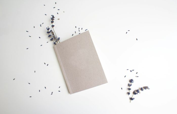 brown book on white table