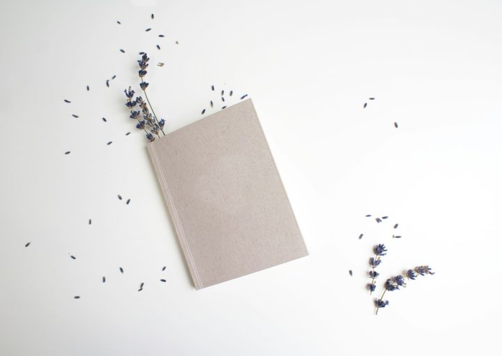brown book on white table