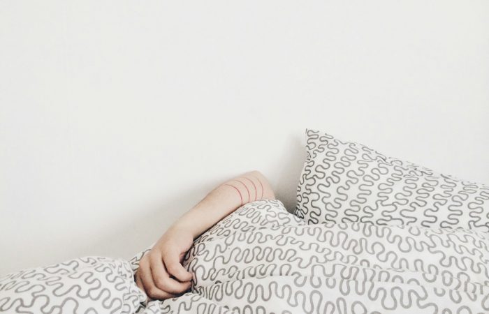 person lying on bed
